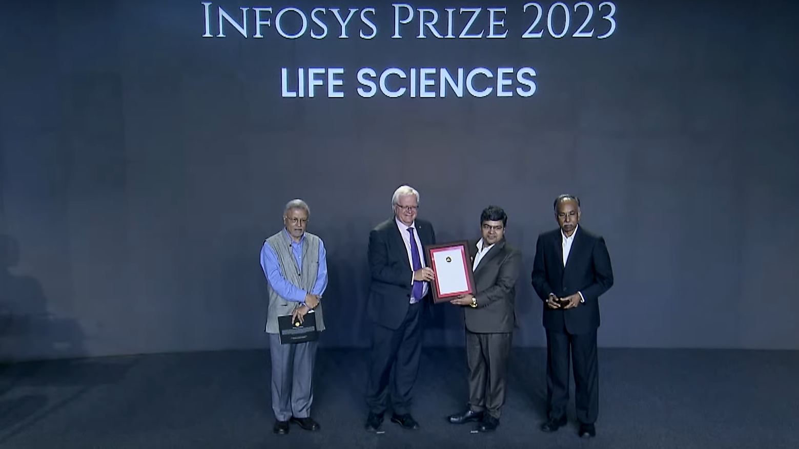 Arun Kumar Shukla recieving the Infosys Prize 2023