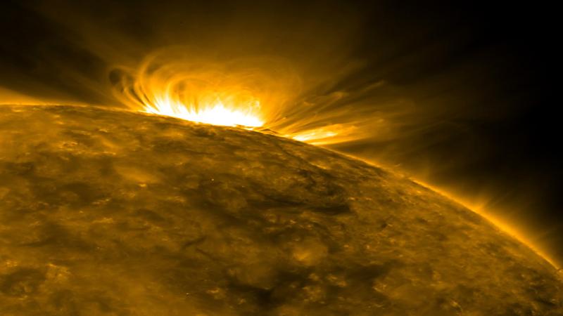 Radio-images of the Sun explains the anomaly in its atmospheric temperature